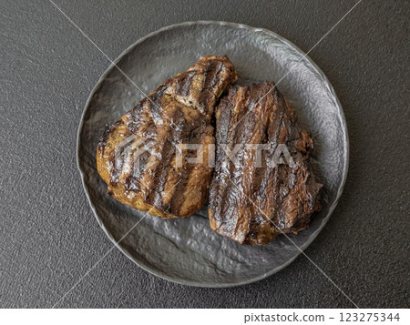 Grilled beef steak with salt, spices and herbs Grilled beef steak with salt, spices and herbs 123275344