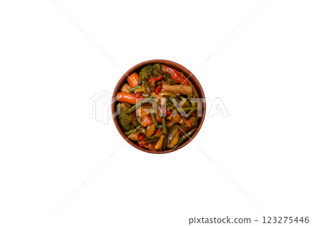 Mix of vegetables corn, carrots, peppers, broccoli, onions in teriyaki sauce 123275446