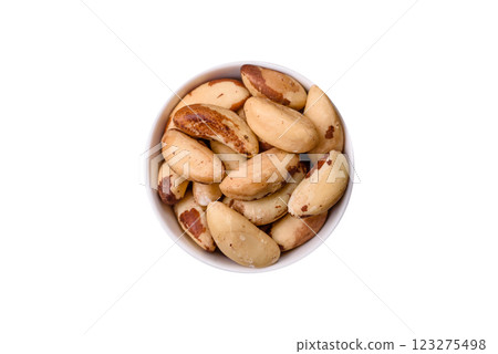 Delicious nutritious brazil nuts in ceramic bowl Delicious nutritious brazil nuts in ceramic bowl 123275498