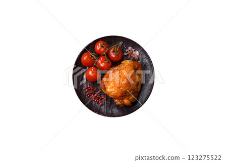 Delicious juicy chicken thighs baked with salt, spices and herbs Delicious juicy chicken thighs baked with salt, spices and herbs 123275522