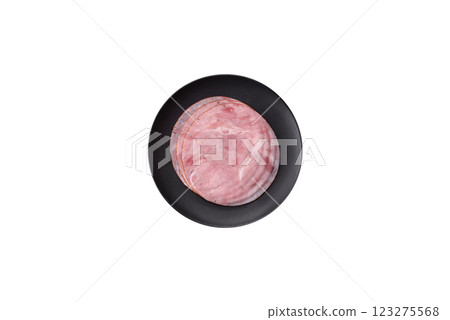 Smoked ham with salt, spices and herbs cut into round slices Smoked ham with salt, spices and herbs cut into round slices 123275568