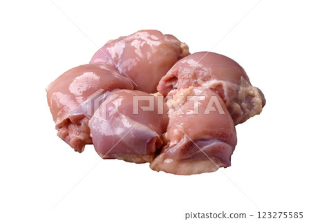 Fresh raw chicken thigh fillets with salt, spices and herbs 123275585