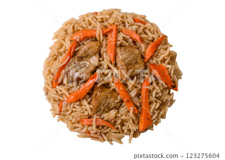 Delicious fresh pilaf with rice, carrots, meat, onions, spices and berries 123275604