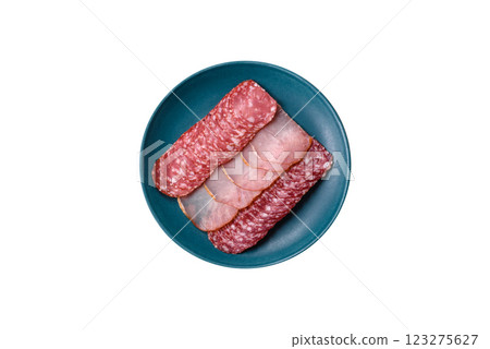 Delicious fresh smoked sausages cut with slices Delicious fresh smoked sausages cut with slices 123275627