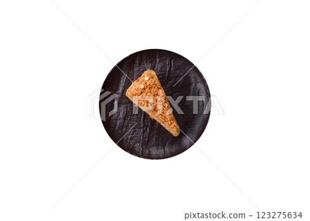 Piece of sweet layer cake Napoleon with custard 123275634