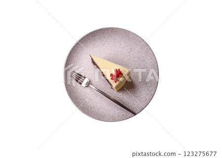 Piece of sweet layered cheesecake with cherries and poppy seeds Piece of sweet layered cheesecake with cherries and poppy seeds 123275677