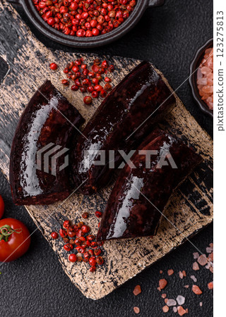 Delicious black blood sausage or black pudding with spices and herbs 123275813
