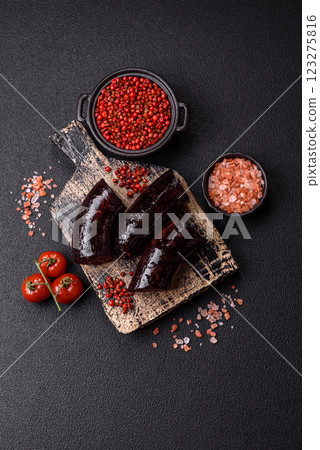 Delicious black blood sausage or black pudding with spices and herbs 123275816