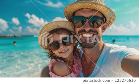 A father and daughter pose happily for a photo on a sunny beach, wearing matching straw hats and sunglasses, capturing the joy of their seaside adventure together A father and daughter pose happily for a photo on a sunny beach, wearing matching straw hats and sunglasses, capturing the joy of their seaside adventure together 123276630