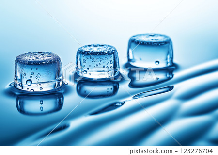 Close-Up of Ice Cubes on a Smooth Surface with Water Droplets and Soft Lighting 123276704