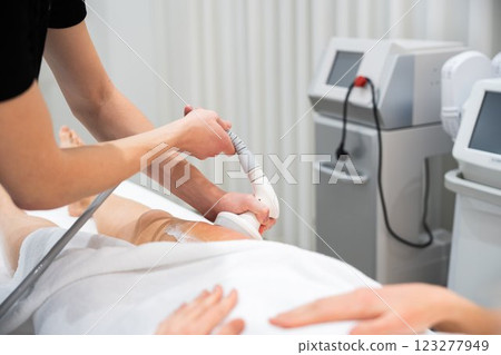 Skin treatment session underway in a modern wellness center Skin treatment session underway in a modern wellness center 123277949