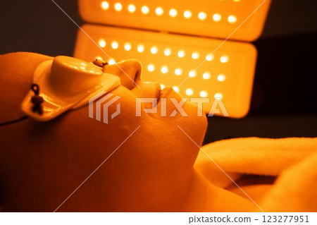Relaxation during light therapy session at a wellness center 123277951