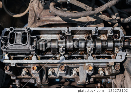 Cylinder head of an auto engine. Car repair. Car service Cylinder head of an auto engine. Car repair. Car service 123278102