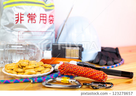 Contents of emergency evacuation bag and opened emergency food 123278657