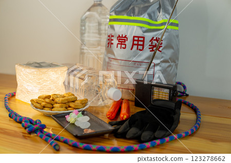 Contents of emergency evacuation bag and opened emergency food 123278662