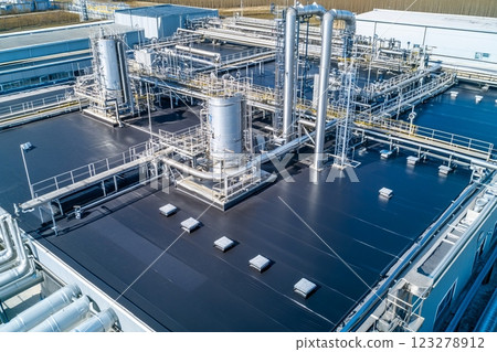 Modern flat roof covered with roofing felt Modern flat roof covered with roofing felt 123278912