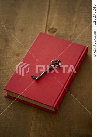 Image of antique book and key Image of antique book and key 123279249