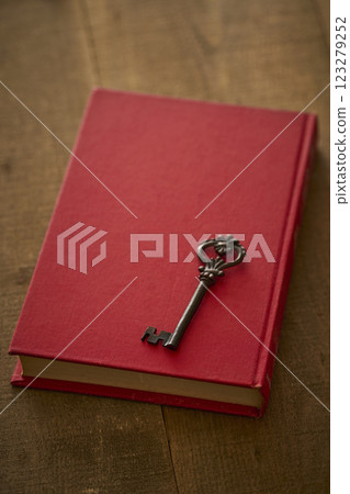 Image of antique book and key Image of antique book and key 123279252