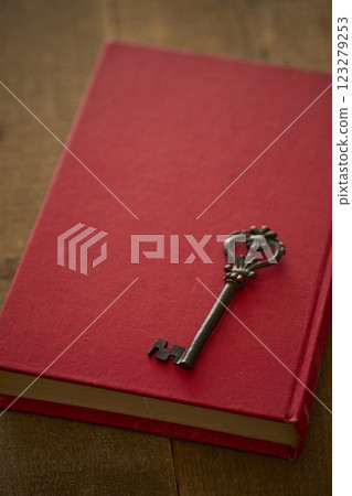 Image of antique book and key Image of antique book and key 123279253