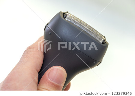 Hand-held electric shaver 123279346