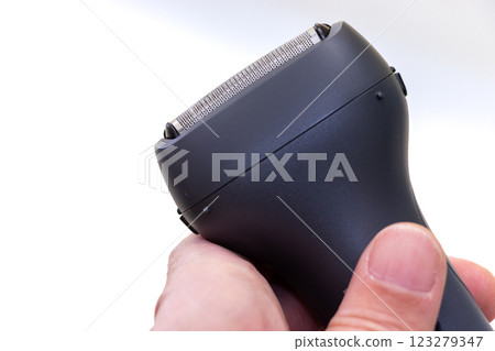 Hand-held electric shaver 123279347