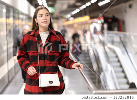 Woman changing to the subway 123282916
