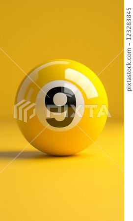 A yellow pool ball with the number 9, a symbol of indoor games and sports 123283845