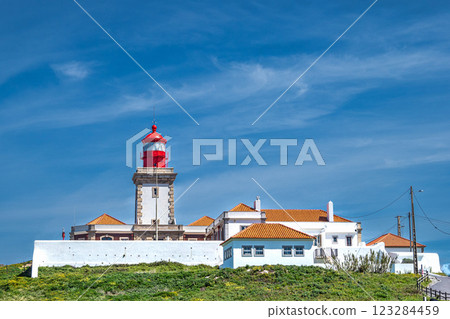 Lighthouse on Cabo da Roca - Roca Cape in Portugal, westernmost point of the Sintra Mountain Range and Europe Lighthouse on Cabo da Roca - Roca Cape in Portugal, westernmost point of the Sintra Mountain Range and Europe 123284459