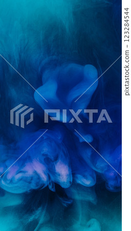 Blue smoke. Abstract background. Blur color paint water explosion fume flow floating shimmering glitter particles art texture. 123284544
