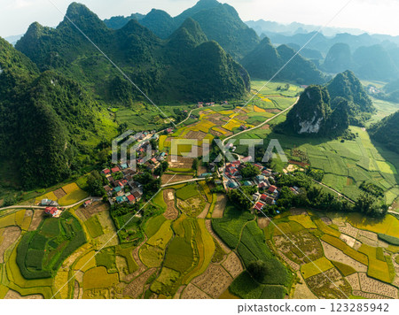 Aerial wide angle view of landscape with rice field at Phong Nam village in Trung Khanh, Cao Bang province,Northern Vietnam Aerial wide angle view of landscape with rice field at Phong Nam village in Trung Khanh, Cao Bang province,Northern Vietnam 123285942
