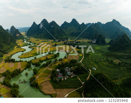 Aerial wide angle view of landscape with rice field at Phong Nam village in Trung Khanh, Cao Bang province,Northern Vietnam Aerial wide angle view of landscape with rice field at Phong Nam village in Trung Khanh, Cao Bang province,Northern Vietnam 123285948