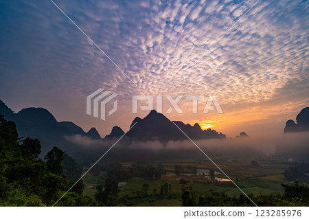 Beautiful sunrise landscape in Phong Nam valley, Amazing scenery landscape at Cao bang province, Northern Vietnam,Travel and nature landscape concept Beautiful sunrise landscape in Phong Nam valley, Amazing scenery landscape at Cao bang province, Northern Vietnam,Travel and nature landscape concept 123285976