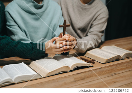Christians are congregants join hands to pray and seek the blessings of God. Christians are congregants join hands to pray and seek the blessings of God. 123286732