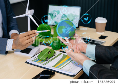Business team people planning hand using laptop for working technology and business Net zero and carbon neutral concept.NET ZERO 123286905
