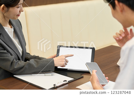 Businesswoman selling digital tools 123287048