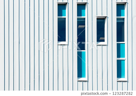 Office building with geometric design in the downtown area of the city. Office building with geometric design in the downtown area of the city. 123287282