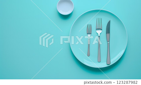 Cutlery, fork, knife, spoon and empty plate on a colored background. AI Generated 123287982