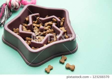 Star shaped slow feeder bowl for dogs Star shaped slow feeder bowl for dogs 123288370
