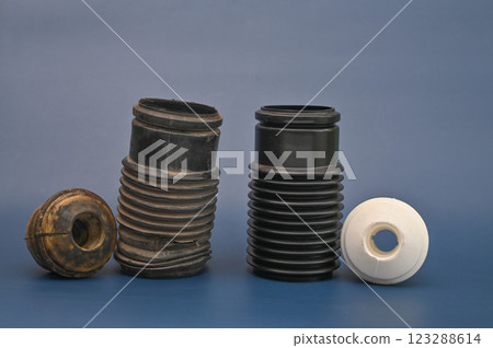 new and old cover for a car shock absorber. new and old cover for a car shock absorber. 123288614