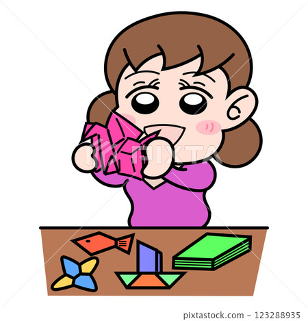 Girl playing with origami 123288935