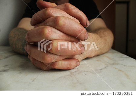 Close-up of men's hands. Hands folded in a close-up lock 123290391