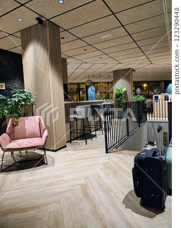 Travel suitcases in a luxurious hotel lobby of tourists Travel suitcases in a luxurious hotel lobby of tourists 123290448