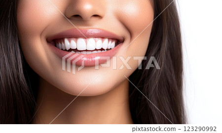 Radiant smile showcasing perfectly aligned, bright white teeth. Captivating dental health and beauty are on full display in this image. 123290992