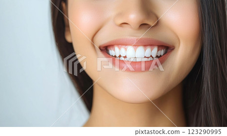 Radiant smile with healthy teeth close-up, showcasing dental aesthetics and oral hygiene, capturing joy and self-confidence. Radiant smile with healthy teeth close-up, showcasing dental aesthetics and oral hygiene, capturing joy and self-confidence. 123290995