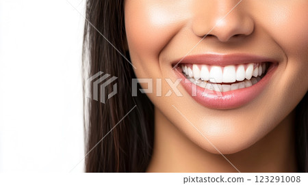 Radiant Smile: A close-up of a woman's perfect smile with bright, white teeth and healthy pink lips. A picture of dental health and beauty. 123291008