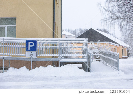 Disabled parking and ramp, inclusive urban infrastructure. Winter day Disabled parking and ramp, inclusive urban infrastructure. Winter day 123291604
