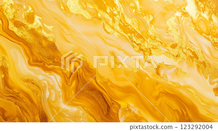 Golden fluid art with marbled effect. Swirling patterns of gold paint create a unique and abstract design. Contemporary style background 123292004