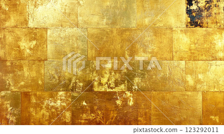 Textured surface composed of shimmering gold squares, some slightly tarnished, creating a rustic and luxurious wall or background. Textured surface composed of shimmering gold squares, some slightly tarnished, creating a rustic and luxurious wall or background. 123292011