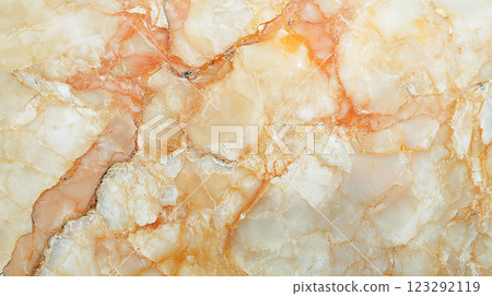 Elegant natural stone texture background featuring light yellow and orange hues with intricate veining patterns for luxurious aesthetic design. Elegant natural stone texture background featuring light yellow and orange hues with intricate veining patterns for luxurious aesthetic design. 123292119
