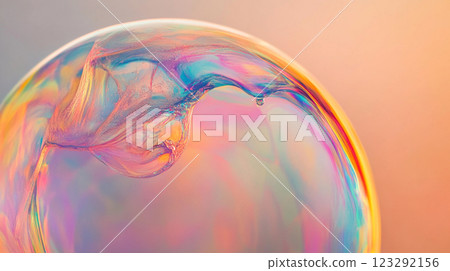 Iridescent bubble with swirling colors, capturing a moment of ephemeral beauty and fragility against a soft gradient backdrop. 123292156